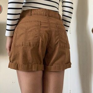 Brown shorts (3 maybe 4” inseam